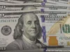 Dólar recua abaixo de R$ 5 após primeiro turno das eleições presidenciais